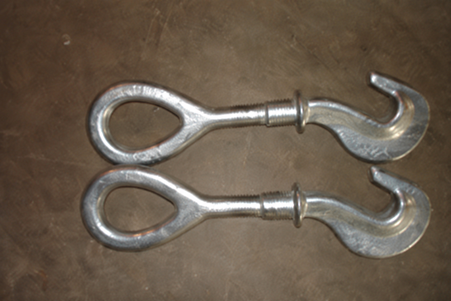 Two steel hook and eye turnbuckles